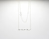 

Collar con colgante de la palabra MAMÁ en plata de ley 925, cadena fina con mosquetón, joyería artesanal Pipa Pirita colección Vínculos