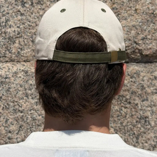 Gorra Pementos de NWHR, 6 paneles en algodón orgánico con bordado frontal y cierre ajustable.