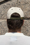 Gorra Pementos de NWHR, 6 paneles en algodón orgánico con bordado frontal y cierre ajustable.
