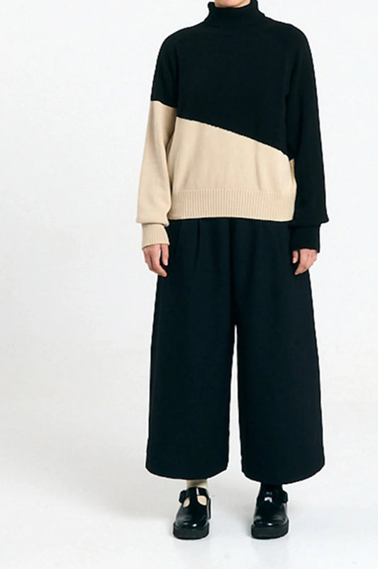 Jersey Luso bicolor black de Suite13Lab en algodón orgánico, cuello alto y mangas raglán