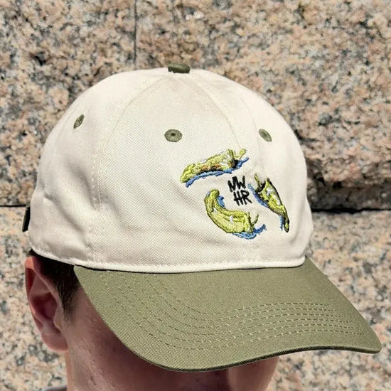 Gorra Pementos de NWHR, 6 paneles en algodón orgánico con bordado frontal y cierre ajustable.