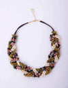 Collar Rianxeira de Montse Betanzos: caracoles enteros y
fragmentos de concha blanca, cierre dorado con alargador.