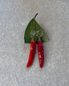 Pendientes Chillie de Syringa Jewels: chiles naturales
encapsulados en resina UV, versión aro plata y aro dorado.