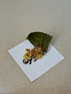 Pendientes Dama Danzante de Syringa Jewels: orquídea
Oncidium amarilla y burdeos encapsulada en resina UV.