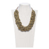 Collar Frouxeira Verde de Montse Betanzos: caracolillos
marinos verdes sobre cordón de algodón encerado, 50 cm.
