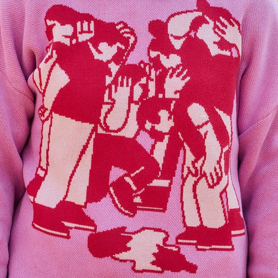 Jersey de punto grueso en color rosa con textura de relieve, cuello redondo y terminaciones acanaladas en puños y cintura, de la marca NWHR.
