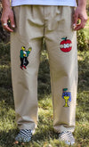 Pantalón tipo chino de color beige con corte relajado, dos pinzas en la parte frontal y cierre de doble botón, fabricado en algodón orgánico por NWHR.