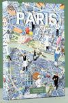 Puzzle de 1000 piezas que muestra un mapa ilustrado de la gastronomía de París, con dibujos de iconos culinarios franceses y barrios emblemáticos sobre fondo en tonos suaves.