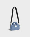 Mini bolso de acabado brillante con estampado Royal, dos asas cortas acolchadas, correa larga extraíble, cremallera superior y etiqueta de piel, marca Wouf.