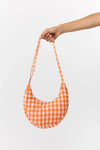 Bolso bandolera Janno Moonbag a cuadros naranja de Suite13Lab, forma media luna en algodón orgánico GOTS.