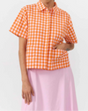 Camisa Eder Check Orange de Suite13Lab, algodón orgánico GOTS, cuadros naranja, manga corta y botones de corozo.