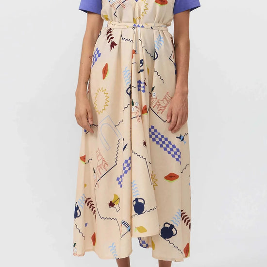 Vestido midi de algodón orgánico y lino con estampado Holiday, tirantes largos ajustables para varias posiciones, escote en pico y espalda descubierta de Suite13 Lab.