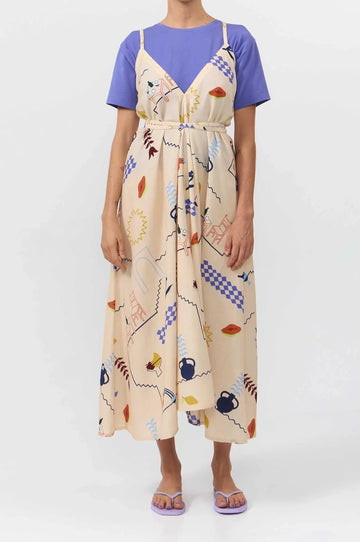 Vestido midi de algodón orgánico y lino con estampado Holiday, tirantes largos ajustables para varias posiciones, escote en pico y espalda descubierta de Suite13 Lab.