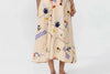 Vestido midi de algodón orgánico y lino con estampado Holiday, tirantes largos ajustables para varias posiciones, escote en pico y espalda descubierta de Suite13 Lab.