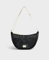 Bolso bandolera de color negro puro, de diseño estructurado con correa cruzada ajustable de algodón, cremallera superior y etiqueta de silicona, modelo Onyx de Wouf.