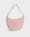 Bolso cruzado de gran tamaño color rosa empolvado en tejido de rejilla (mesh) con correa ajustable de algodón, cremallera superior y bolsillos interiores, marca Wouf.