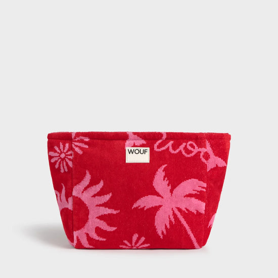 Neceser de tamaño grande en suave tela de rizo jacquard de algodón orgánico, con cremallera y etiqueta de silicona, modelo Tulum de la marca Wouf.