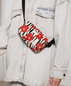 Mini bag bandolera Wildflower de Wouf, 19×10×5 cm, poliéster reciclado con estampado floral y strap ajustable