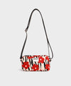 Mini bag bandolera Wildflower de Wouf, 19×10×5 cm, poliéster reciclado con estampado floral y strap ajustable