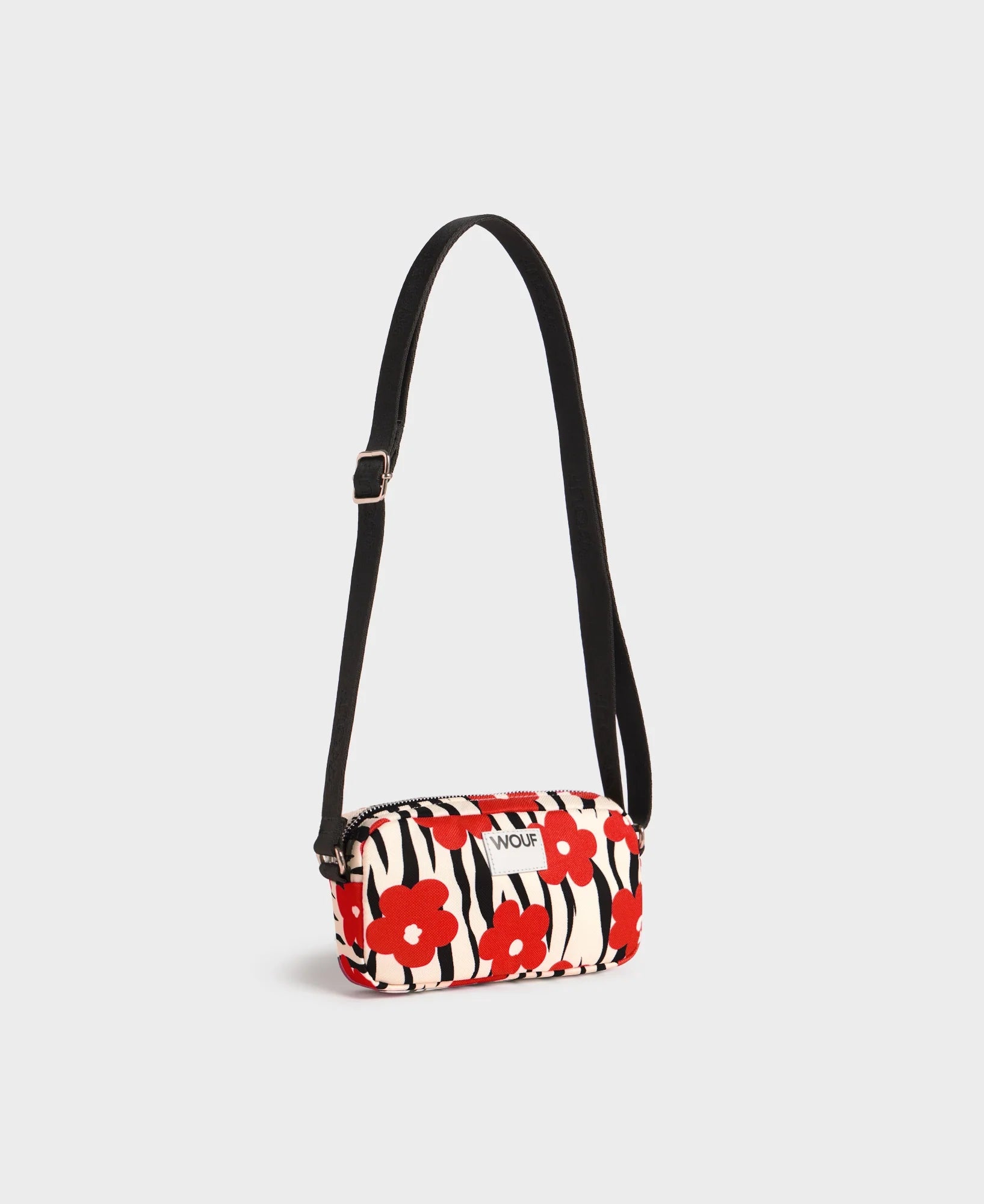 Mini bag bandolera Wildflower de Wouf, 19×10×5 cm, poliéster reciclado con estampado floral y strap ajustable