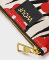 Cartera Wildflower de Wouf, 13×9 cm, poliéster reciclado con estampado floral y ranura de cuero reciclado.